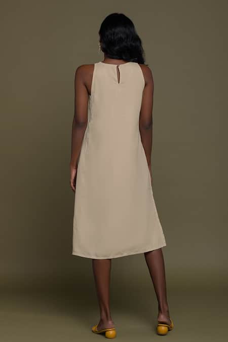 Shop Reistor Beige Hemp V Neck Side Pocket Dress at Aza Fashions Shop_Reistor_Beige Hemp V Neck Side Pocket Dress _at_Aza_Fashions