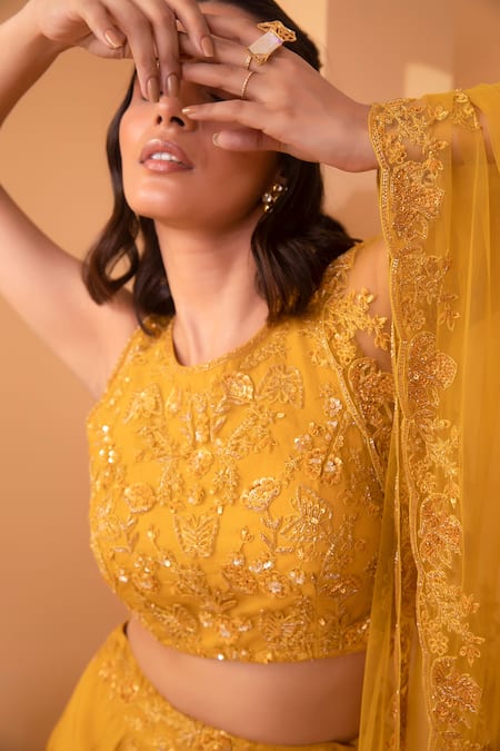 Miku Kumar_Yellow Organza, Net Floral Motifs Round Embroidered Lehenga Set_at_Aza_Fashions