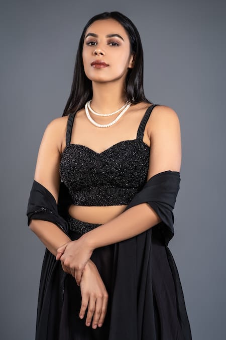 Shahmeen Husain_Black Raw Silk, Organza Glass Beads Sweetheart Neck Layered Skirt Set _at_Aza_Fashions