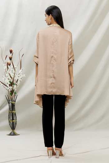 Shop Kommal Sood Beige Satin Embellished Stone V Neck Asymmetric Tunic at Aza Fashions Shop_Kommal Sood_Beige Satin Embellished Stone V Neck Asymmetric Tunic _at_Aza_Fashions