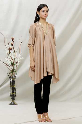 Kommal Sood Beige Satin Embellished Stone V Neck Asymmetric Tunic Online at Aza Fashions Kommal Sood_Beige Satin Embellished Stone V Neck Asymmetric Tunic _Online_at_Aza_Fashions