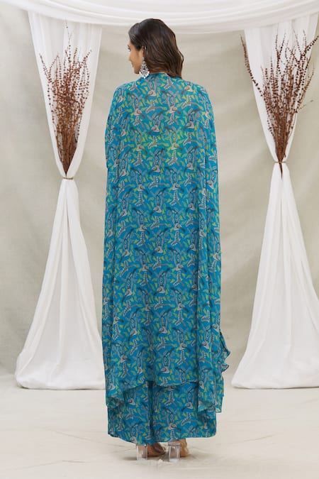 Shop Priti Sahni Blue Blouse Raw Silk, Cape Georgette, Palazzo Gond Tribal Art Print And Set at Aza Fashions Shop_Priti Sahni_Blue Blouse Raw Silk, Cape Georgette, Palazzo Gond Tribal Art Print And Set _at_Aza_Fashions