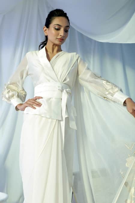 Shop_Madder Much_White 80% Cotton 20% Silk Floral V Neck Niko Embroidered Sleeve Top _Online_at_Aza_Fashions