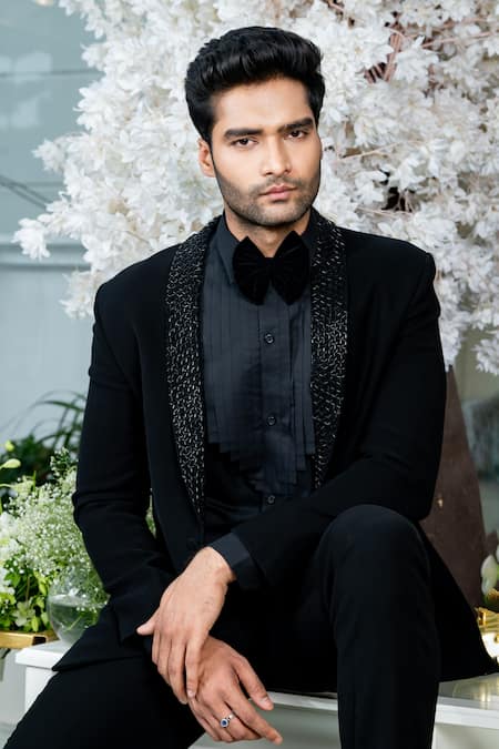 Shop Varun Chakkilam Black Poly Blend Suiting Fabric Cutdana Lapel Collar Blazer And Pant Set at Aza Fashions Shop_Varun Chakkilam_Black Poly Blend Suiting Fabric Cutdana Lapel Collar Blazer And Pant Set _at_Aza_Fashions