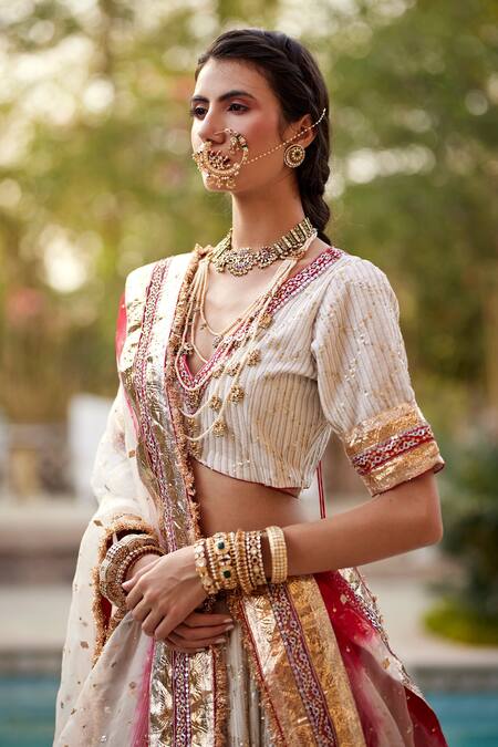 Bride in Light Pink Lehenga With Carnation Necklace, Indian Attire