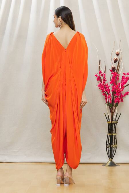 Shop Megha Garg Orange Crepe Sequins, Beads V Neck Draped Jumpsuit at Aza Fashions Shop_Megha Garg_Orange Crepe Sequins, Beads V Neck Draped Jumpsuit _at_Aza_Fashions