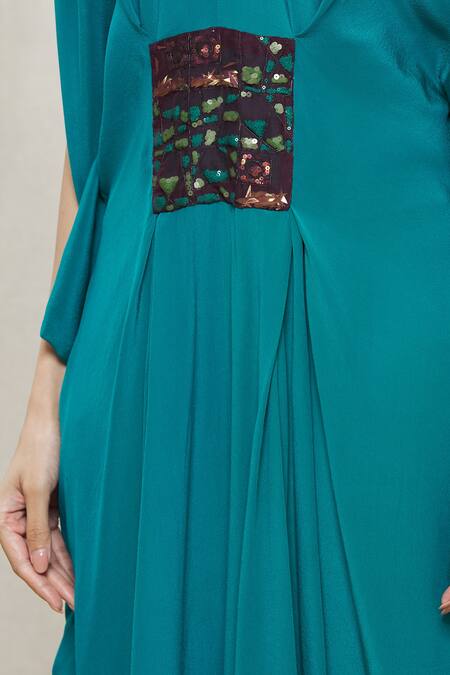 Megha Garg Blue Crepe Sequins V Neck Draped Jumpsuit at Aza Fashions Megha Garg_Blue Crepe Sequins V Neck Draped Jumpsuit _at_Aza_Fashions