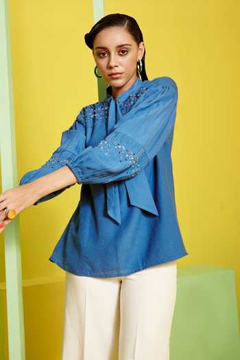 Shop Label Deepika Nagpal Blue Linen Lining Dyed Crepe Sequin And Cutdana Bow Pussy Top at Aza Fashions Shop_Label Deepika Nagpal_Blue Linen Lining Dyed Crepe Sequin And Cutdana Bow Pussy Top_at_Aza_Fashions