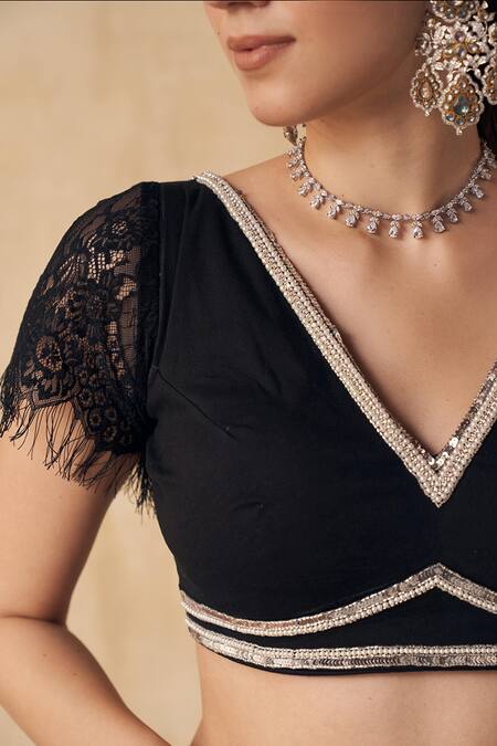 SAKSHI GIRRI_Black Organza, Cotton Modal Lycra Floral V Neck Pre-draped Saree With Blouse_at_Aza_Fashions