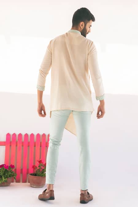 Shop Vaani Beswal Peach Handwoven Cotton Coco Asymmetric Overlap Kurta at Aza Fashions Shop_Vaani Beswal_Peach Handwoven Cotton Coco Asymmetric Overlap Kurta _at_Aza_Fashions