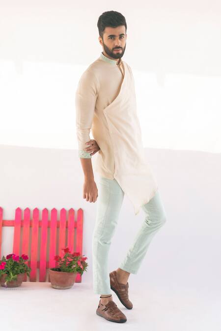 Vaani Beswal Peach Handwoven Cotton Coco Asymmetric Overlap Kurta Online at Aza Fashions Vaani Beswal_Peach Handwoven Cotton Coco Asymmetric Overlap Kurta _Online_at_Aza_Fashions