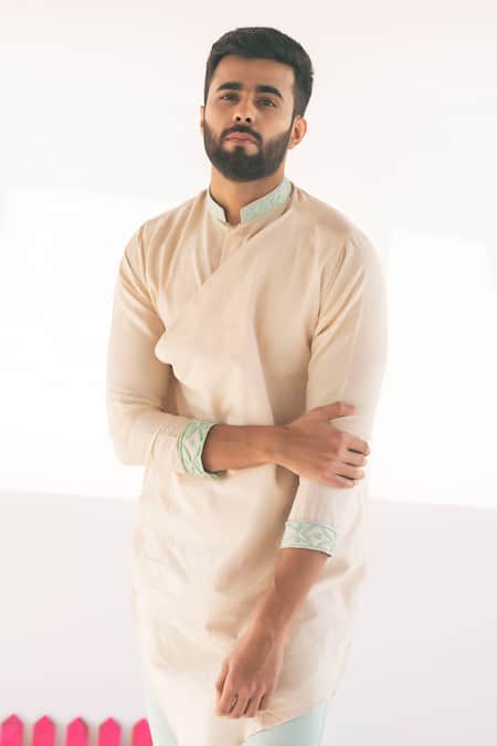 Shop Vaani Beswal Peach Handwoven Cotton Coco Asymmetric Overlap Kurta Online at Aza Fashions Shop_Vaani Beswal_Peach Handwoven Cotton Coco Asymmetric Overlap Kurta _Online_at_Aza_Fashions