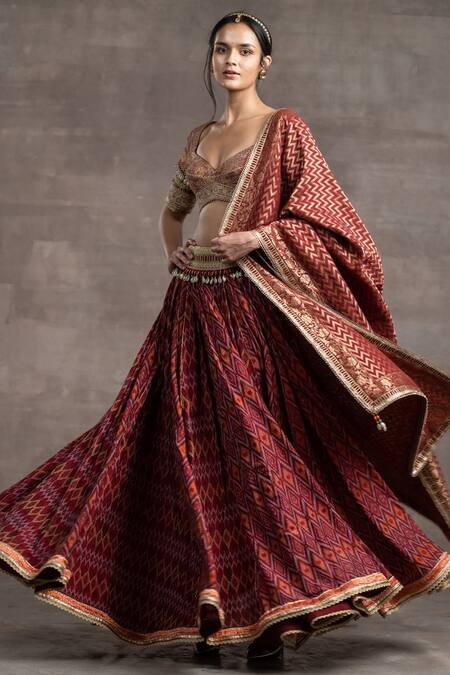 Buy_Tarun Tahiliani_Maroon Brocade Chanderi, Ikat Geometric Motifs Plunged V-neck Print Lehenga Set_Online_at_Aza_Fashions