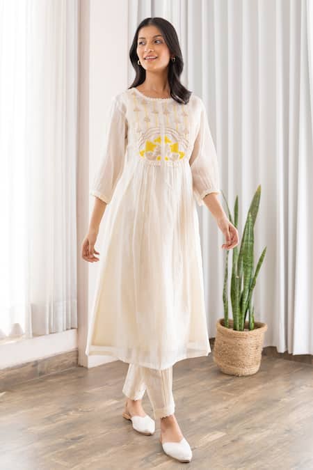 Shop Khamaj India White Cotton, Chanderi Floral Round Kurta And Pant Set at Aza Fashions Shop_Khamaj India_White Cotton, Chanderi Floral Round Kurta And Pant Set _at_Aza_Fashions