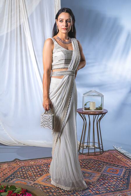 White Sleeveless Handloom Pure Raw Silk Stiched Blouse with scoop neck –  Sandook Collective