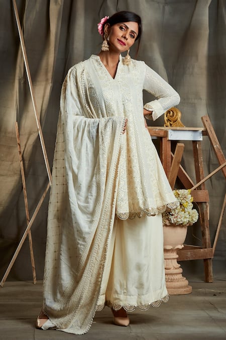 Shop Sunita Nagi White Dupion, Semi Pure Lucknowi Floral, Sequin V Chikankari Kurta Palazzo Set at Aza Fashions Shop_Sunita Nagi_White Dupion, Semi Pure Lucknowi Floral, Sequin V Chikankari Kurta Palazzo Set _at_Aza_Fashions