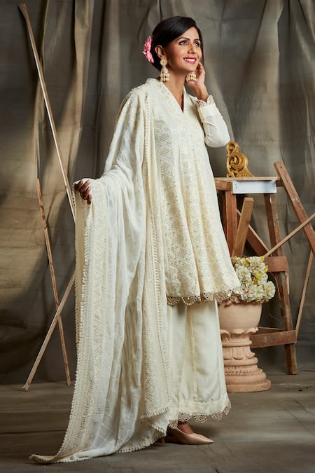 Sunita Nagi White Dupion, Semi Pure Lucknowi Floral, Sequin V Chikankari Kurta Palazzo Set Online at Aza Fashions Sunita Nagi_White Dupion, Semi Pure Lucknowi Floral, Sequin V Chikankari Kurta Palazzo Set _Online_at_Aza_Fashions