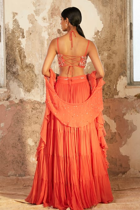 Shop_Shloka Khialani_Peach Net, Crepe, Georgette Floral V Neck Millie Tiered Lehenga Set _at_Aza_Fashions