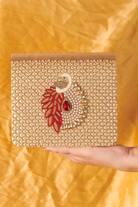 Shop The Purple Sack Gold Embroidery Mayuraa Embellished Clutch With Sling at Aza Fashions Shop_The Purple Sack_Gold Embroidery Mayuraa Embellished Clutch With Sling _at_Aza_Fashions