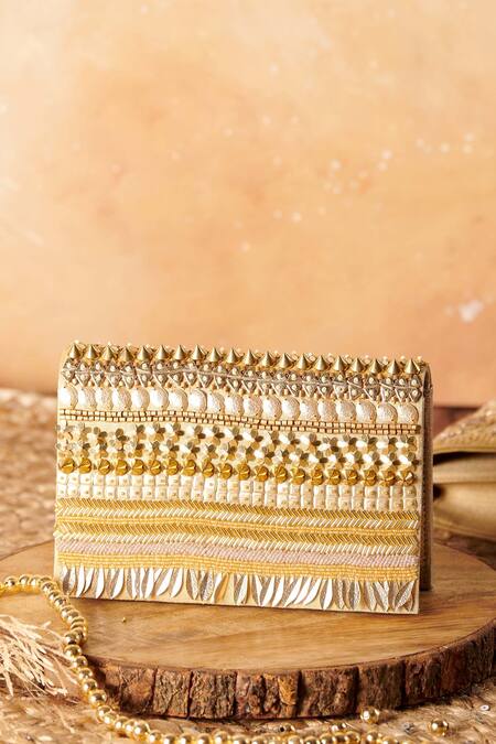 Shop The Purple Sack Gold Embroidery Unnati Embellished Clutch With Sling at Aza Fashions Shop_The Purple Sack_Gold Embroidery Unnati Embellished Clutch With Sling _at_Aza_Fashions