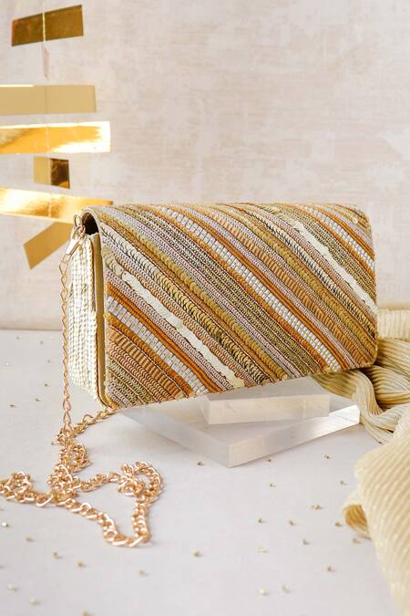 The Purple Sack Gold Embroidery Farnama Embellished Clutch With Sling Online at Aza Fashions The Purple Sack_Gold Embroidery Farnama Embellished Clutch With Sling _Online_at_Aza_Fashions
