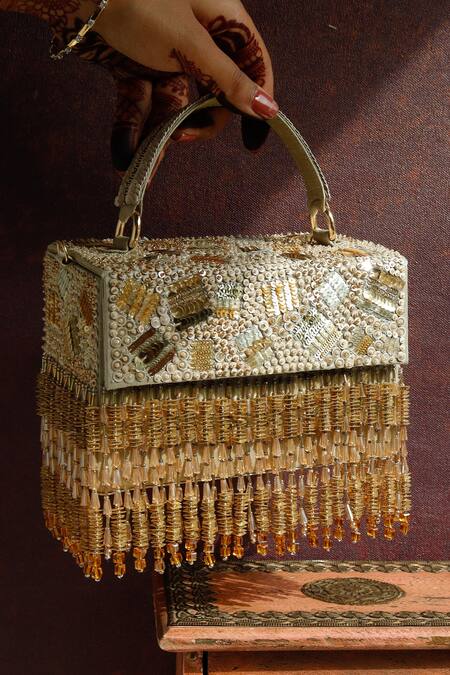 Shop The Purple Sack Gold Embroidery, Beads Rizuana Embellished Clutch With Sling at Aza Fashions Shop_The Purple Sack_Gold Embroidery, Beads Rizuana Embellished Clutch With Sling _at_Aza_Fashions