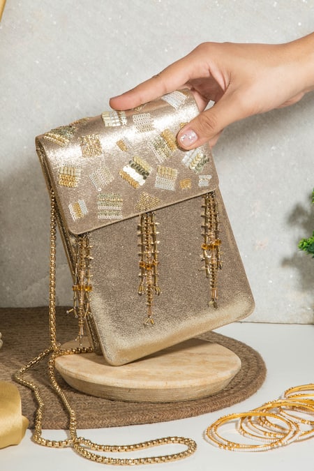Shop The Purple Sack Gold Sequins, Beads Nagma Embellished Clutch With Sling at Aza Fashions Shop_The Purple Sack_Gold Sequins, Beads Nagma Embellished Clutch With Sling _at_Aza_Fashions