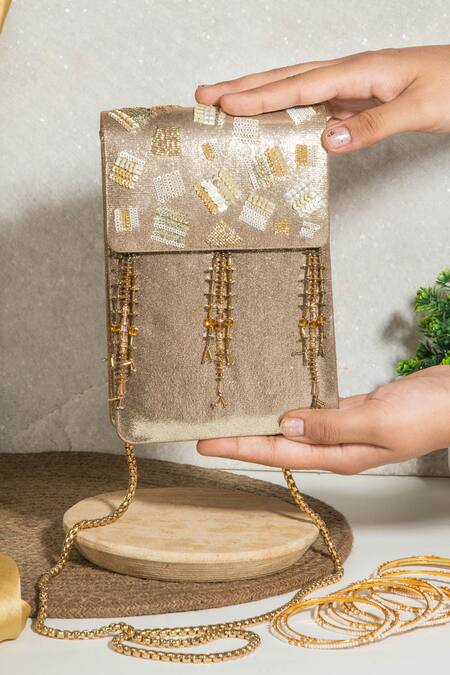 The Purple Sack Gold Sequins, Beads Nagma Embellished Clutch With Sling Online at Aza Fashions The Purple Sack_Gold Sequins, Beads Nagma Embellished Clutch With Sling _Online_at_Aza_Fashions