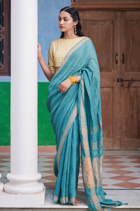 Pale yellow flower and leaf pattern handloom linen saree – Kasturi Creations