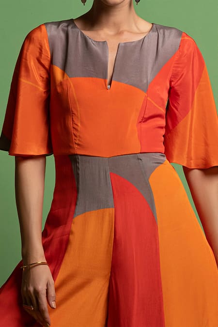 Nautanky Red Natural Crepe Abstract Shape Print Round Dressing Up Colourblock Jumpsuit at Aza Fashions Nautanky_Red Natural Crepe Abstract Shape Print Round Dressing Up Colourblock Jumpsuit _at_Aza_Fashions