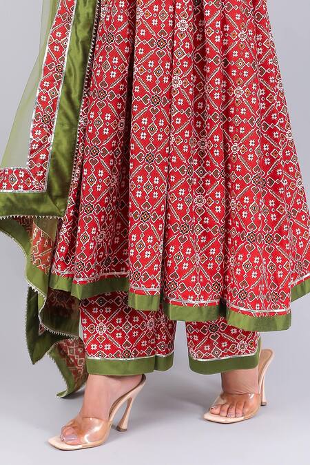 Pomcha Jaipur_Red Cotton, Net Tassels Round Neck Patola Print Anarkali Palazzo Set _Online_at_Aza_Fashions