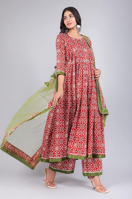 Buy_Pomcha Jaipur_Red Cotton, Net Tassels Round Neck Patola Print Anarkali Palazzo Set _Online_at_Aza_Fashions