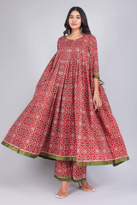 Pomcha Jaipur_Red Cotton, Net Tassels Round Neck Patola Print Anarkali Palazzo Set _at_Aza_Fashions
