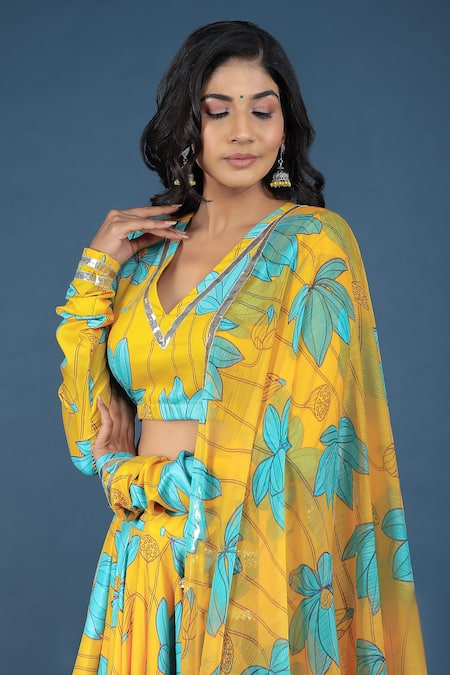 Pomcha Jaipur_Yellow Muslin, Chiffon Gota Patti V-neck Bush Lily Lehenga Set _at_Aza_Fashions
