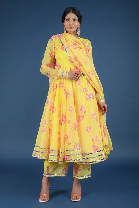 Pomcha Jaipur_Yellow Organza, Cotton Tassels Round Neck Flora Print Anarkali Pant Set _Online_at_Aza_Fashions