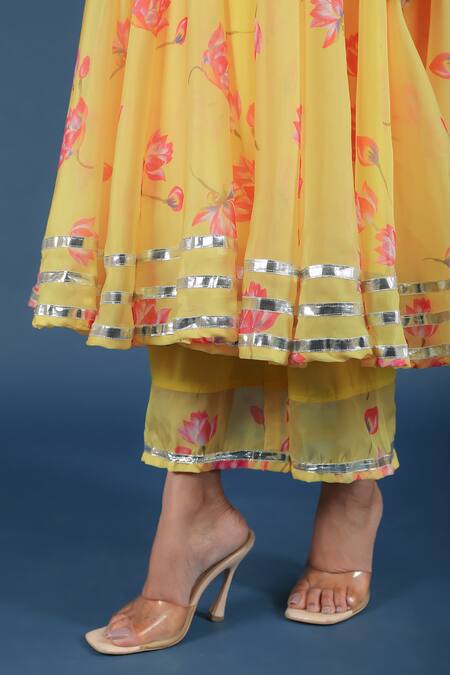 Pomcha Jaipur_Yellow Organza, Cotton Tassels Round Neck Flora Print Anarkali Pant Set _at_Aza_Fashions