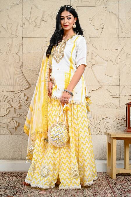 Buy Yuvraani Jaipur Yellow Silk, Organza, Shantoon Zardozi Round Embroidered Kurta Lehenga Set Online at Aza Fashions Buy_Yuvraani Jaipur_Yellow Silk, Organza, Shantoon Zardozi Round Embroidered Kurta Lehenga Set _Online_at_Aza_Fashions