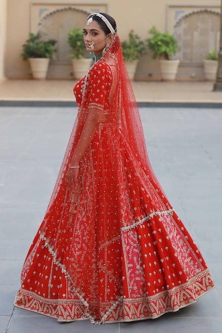 Shop Amrin Khan Red Raw Silk Zardozi Floral Motifs Leaf Neck Embroidered Bridal Lehenga Set at Aza Fashions Shop_Amrin Khan_Red Raw Silk Zardozi Floral Motifs Leaf Neck Embroidered Bridal Lehenga Set _at_Aza_Fashions