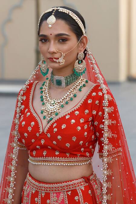 Buy Amrin Khan Red Raw Silk Zardozi Floral Motifs Leaf Neck Embroidered Bridal Lehenga Set Online at Aza Fashions Buy_Amrin Khan_Red Raw Silk Zardozi Floral Motifs Leaf Neck Embroidered Bridal Lehenga Set _Online_at_Aza_Fashions