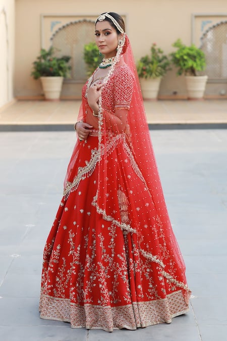 Buy Amrin Khan Red Raw Silk Zardozi Floral Motifs Leaf Neck Embroidered Bridal Lehenga Set Online at Aza Fashions Buy_Amrin Khan_Red Raw Silk Zardozi Floral Motifs Leaf Neck Embroidered Bridal Lehenga Set _Online_at_Aza_Fashions