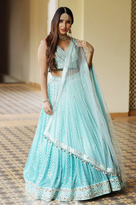 Amrin Khan_Blue Raw Silk, Net Mirror Work V Neck Ornamented Ombre Lehenga Set _Online_at_Aza_Fashions