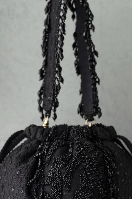 Shop Amyra Black Embroidery, Tassels Kohl Silk Bucket Bag at Aza Fashions Shop_Amyra_Black Embroidery, Tassels Kohl Silk Bucket Bag _at_Aza_Fashions