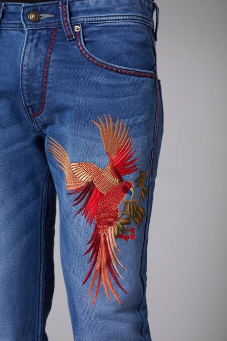 Buy_Rohit Bal_Blue Denim Eagle Motif Jeans _Online_at_Aza_Fashions