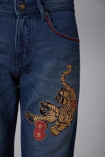 Buy_Rohit Bal_Blue Denim Tiger Motif Regular Fit Jeans _Online_at_Aza_Fashions