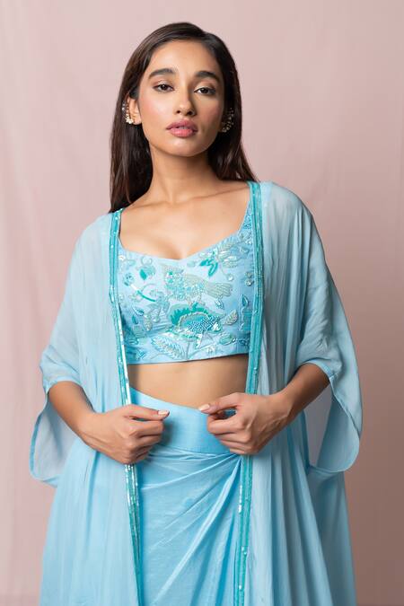 Shop Pinup By Astha Blue Silk, Flat Chiffon Floral, Sequin Blouse V Neck, Frill And Draped Skirt Set Online at Aza Fashions Shop_Pinup By Astha_Blue Silk, Flat Chiffon Floral, Sequin Blouse V Neck, Frill And Draped Skirt Set _Online_at_Aza_Fashions