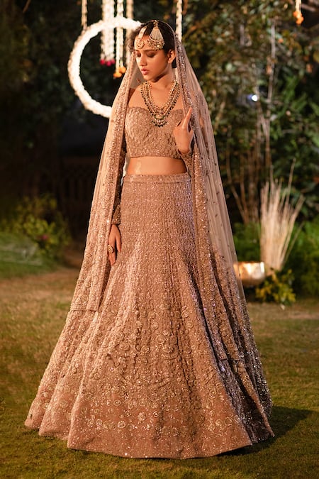 Gold bridal lehenga with heavy flared bottom and two dupattas – Ricco India