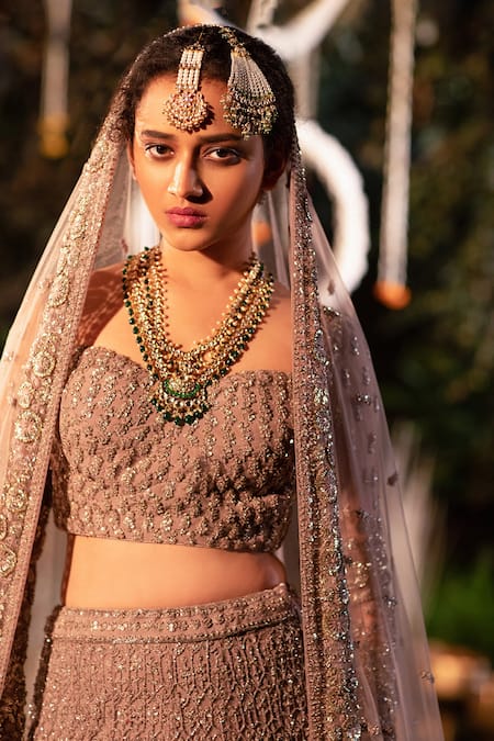 Shop Pallavi Poddar Brown Net Floral-geometric Motifs Latka Embroidered Bridal Lehenga Set at Aza Fashions Shop_Pallavi Poddar_Brown Net Floral-geometric Motifs Latka Embroidered Bridal Lehenga Set_at_Aza_Fashions