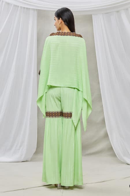 Shop Ankur J Green Lurex Crepe Bead Work, Sequins Boat Neck Asymmetric Kaftan And Gharara Set at Aza Fashions Shop_Ankur J_Green Lurex Crepe Bead Work, Sequins Boat Neck Asymmetric Kaftan And Gharara Set _at_Aza_Fashions