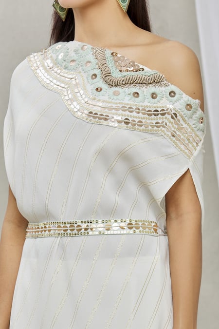 Ankur J White Lurex Crepe Bead Work, Sequins One Shoulder Isdus Draped Cape And Pant Set at Aza Fashions Ankur J_White Lurex Crepe Bead Work, Sequins One Shoulder Isdus Draped Cape And Pant Set _at_Aza_Fashions