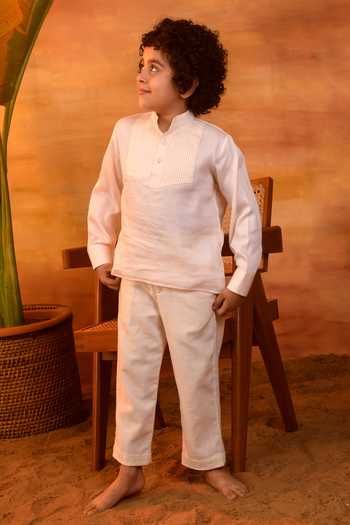 Buy Littleens Peach Cotton Satin Pecan Dribble Pintuck Shirt Online at Aza Fashions Buy_Littleens_Peach Cotton Satin Pecan Dribble Pintuck Shirt _Online_at_Aza_Fashions